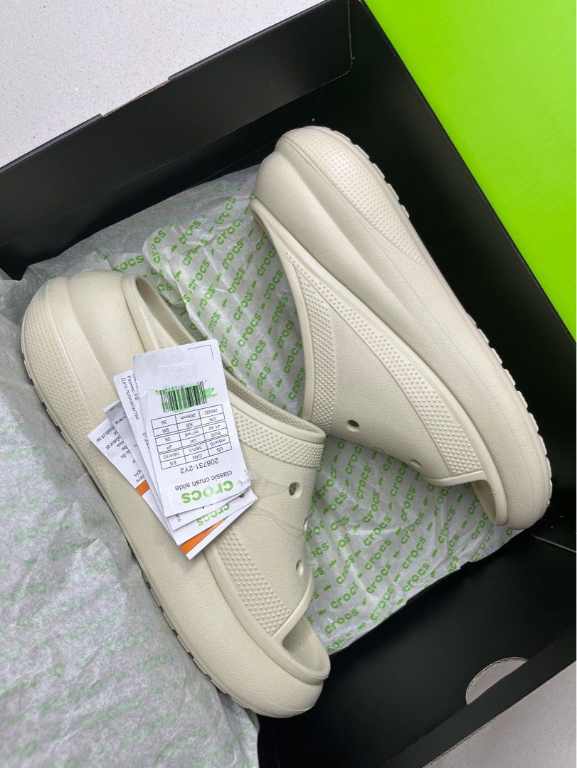 Classic Crush Slide in Bone (Category: Slippers & Slides) located in Pasig City. Submitted by oysterdy (Listing ID 1350978313, Image 1). Description: Classic Crush Slide in Bone Men’s 8/ Women’s 10 (unisex) Iconic Crocs Comfort Lightweight. Flexible. 360-degree comfort. Authentic With box, tags and shopping bag SRP P3995 Super discounted. Firm with price😊.