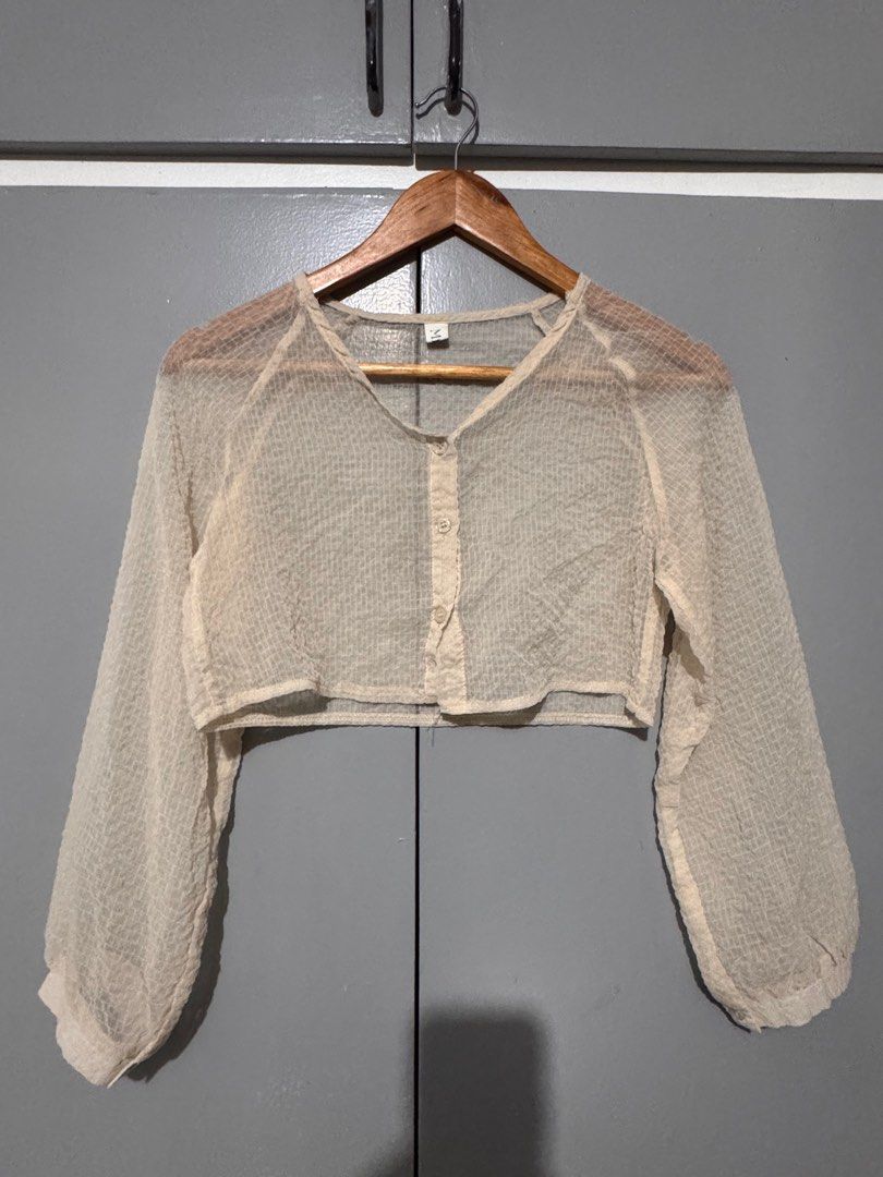 Cropped See through Cardigan (Category: Others Tops) located in Las Pinas. Submitted by trsrcart (Listing ID 1351061491, Image 1). Description: Size: shoulder - 43cm; sleeve length: 48cm.