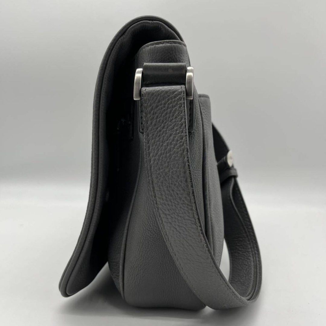 Giorgio Armani Messenger Bag (Category: Luxury Bags & Wallets) located in Baguio. Submitted by thrift_saver07 (Listing ID 1350949926, Image 3). Description: Dark Grey Magnetic Flap Main Conpartment Inner Zip Pocket Zipper 2 compartment Magnetic back compartment Signs of usage Authentic 100% Selling low Giorgio Armani navy calf leather It's a body bag The GA logo is embossed on the leather of the front cover as an accent. This bag is made of soft 