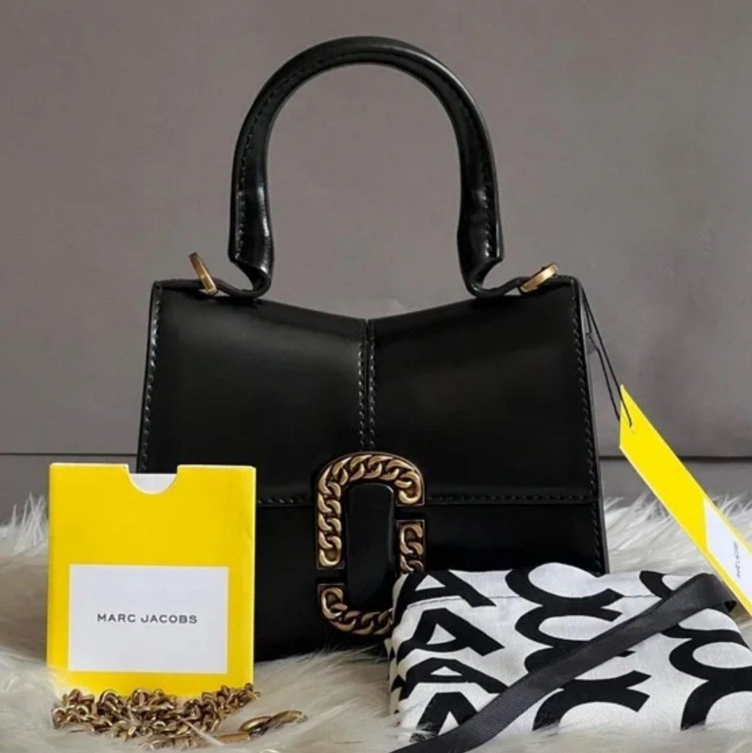 Marc jacobs sling with top handle (Category: Luxury Bags & Wallets) located in Quezon City. Submitted by handpickerbag (Listing ID 1350914026, Image 1). Description: new model/collection bags by Marc Jacobs 💯authentic from US with inclusions IF DOUBT DONT BUY..para di sayang oras natin pareho...