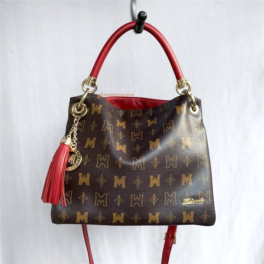Metro City 2-way Sling/Handbag (Category: Luxury Bags & Wallets) located in Bulacan. Submitted by sweetmarijane (Listing ID 1351037744, Image 1). Description: ~ Color: 2 toned brown/red ~ Personal Collection ~ Rare finds ~ Like new ~ No flaws, no issue, no rubs 💛Guaranteed Authentic 🧡Please no lowballing! 🤎All the details are in the photos 🤎This is not a brand new product, manage your expectations—preloved pieces may show signs of wear.