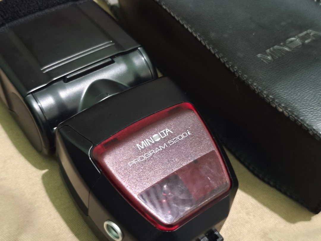 Minolta program 5200i flash (Category: Flashes) located in Taguig. Submitted by juliestjuly (Listing ID 1350983396, Image 2). Description: flash with diffuser Automatic flash for Minolta film cameras with iISO flash shoe (aka "reversed" hotshoe). Zoom for focal lengths 24-85mm. Guide number up to 52..