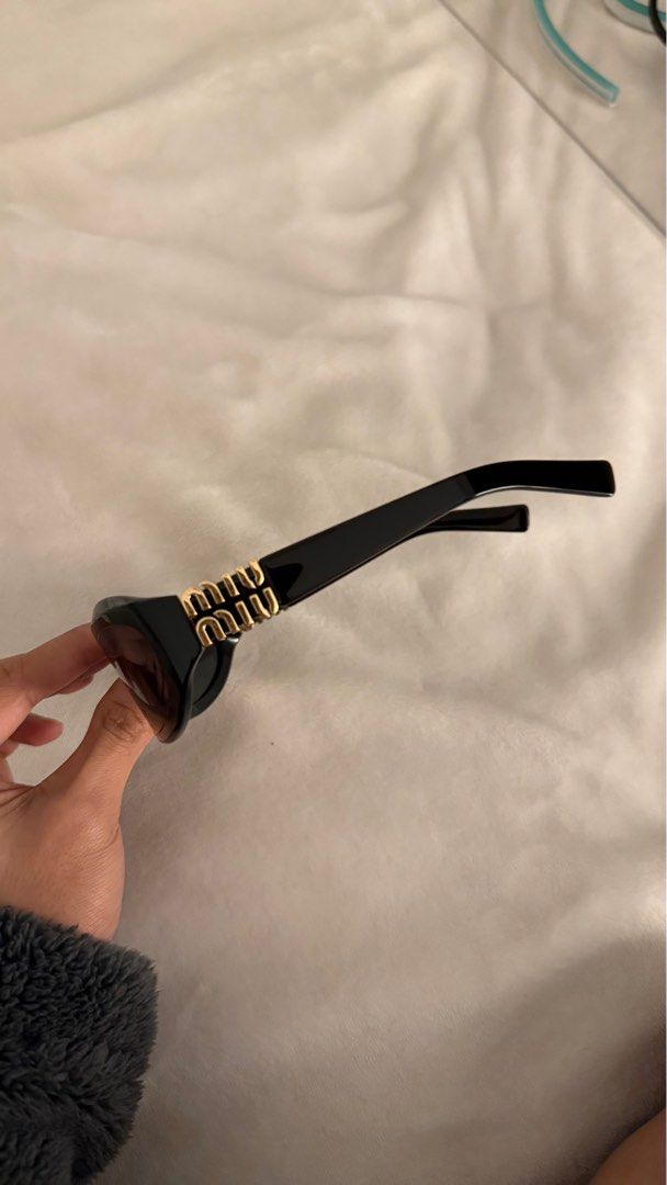 Miu Miu Shades (Category: Luxury Bags & Wallets) located in Malolos. Submitted by zai_g (Listing ID 1351040559, Image 3). Description: Inclusions: ✅ Box ✅ Dust Bag ✅ Authenticity Card RTS: Need to upgrade ☺️ .