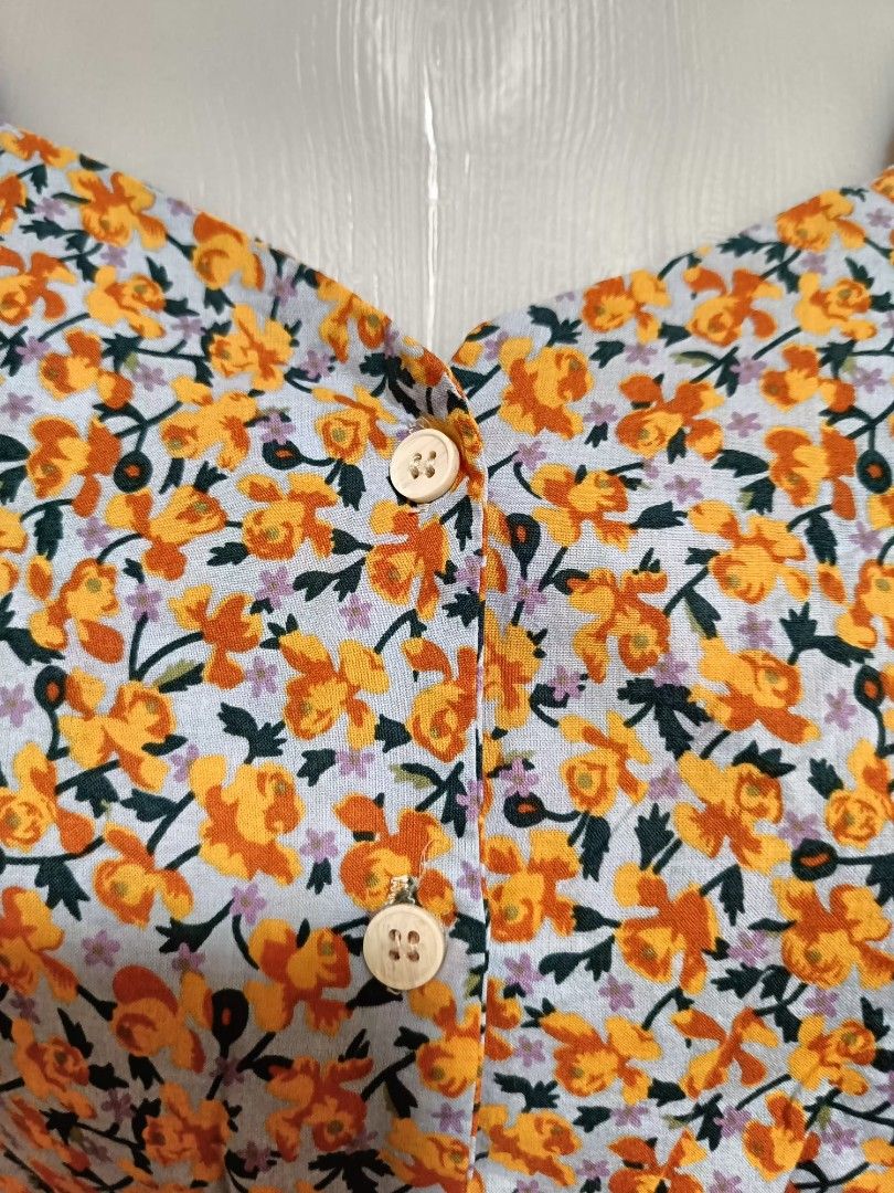 Orange floral puff sleeves (Category: Blouses) located in Quezon City. Submitted by faramiza (Listing ID 1350912226, Image 2). Description: best fit to medium to semi large.