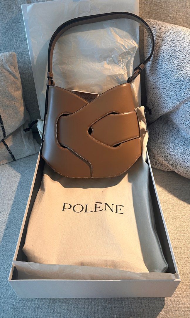 Polene Nodde Hobo smooth root brand new (Category: Shoulder Bags) located in Makati City. Submitted by arata_ (Listing ID 1350876062, Image 1). Description: Polène Nodde Hobo Edition Smooth Root Brand new — never used On hand and just arrived! With box and complete packaging from Polène. In photo for reference I’m 5’5” tall and 39 weeks pregnant for size reference. RFS: giving birth and was planning to use it but need to just sell it. Price inclu
