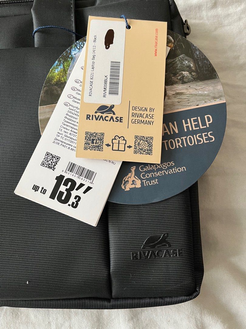 Rivacase 13.3 Black Laptop Bag (Category: Laptop Bags & Sleeves) located in Makati City. Submitted by messbless (Listing ID 1350939953, Image 3). Description: With strap and extra compartments inside.