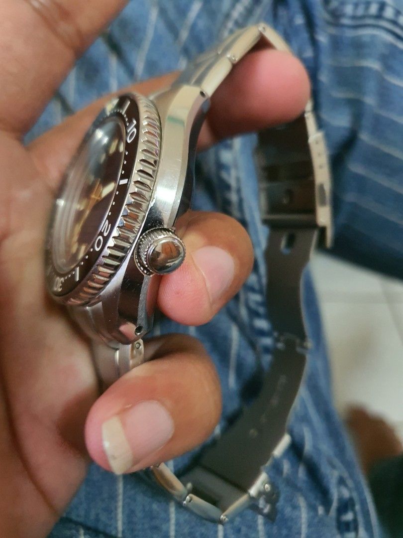 SEIKO MARINE MASTER 300 SBDX012 (Category: Men's Watches) located in Lapu Lapu. Submitted by watchenthusiast4444 (Listing ID 1350950390, Image 3). Description: SEIKO MOD WATCH MARINE MASTER AM MONOBLOCK CASE SEIKO NH35 AUTOMATIC MOVEMENT -5 SECONDS PER DAY ACCURACY SAPPHIRE CRYSTAL CERAMIC BEZEL INSERT 300METERS WATER RESISTANT GOLD MARINE MASTER DIAL AND HANDS NOTE THIS IS A MOD WATCH TO THE SBDX012 SEIKO THE ORIG SBDX012 IS NOW AROUND 4000$ IN 