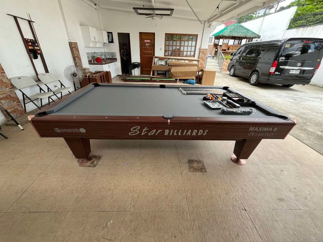 Star Maxima 8 Billiard Table (Category: Billiards and Bowling) located in San Pablo. Submitted by ablpsports (Listing ID 1350970068, Image 3). Description: MAXIMA 8 BILLIARD TABLE S P E C S : ✅ Standard Size (5x9 ft.) (Tournament) ✅ Slate: Granite ✅ Cushion: Master Banda ✅ Corner Pocket Cover: Metal Complete Accessories Included ✅ BILLIARD CLOTH WITH WHITE CLOTH ✅ BILLIARD BALL SET ✅ AUTOBALL BILLIARD POCKET ORIGINAL ✅ STANDARD PLASTIC TRIANGLE ✅