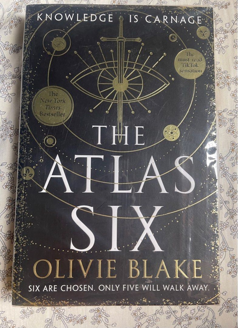 The Atlas Six by Olivie Blake (Category: Storybooks) located in Taguig. Submitted by mieiiee (Listing ID 1350979205, Image 1). Description: The book cover is in good condition, except for the obvious foxing of the pages on the side. It is unread and unused pa. It was stocked improperly at the store I bought the book from(SG WHSmith), which explains the price tag at the back. Currently wrapped in plastic for protection. For more information, feel 