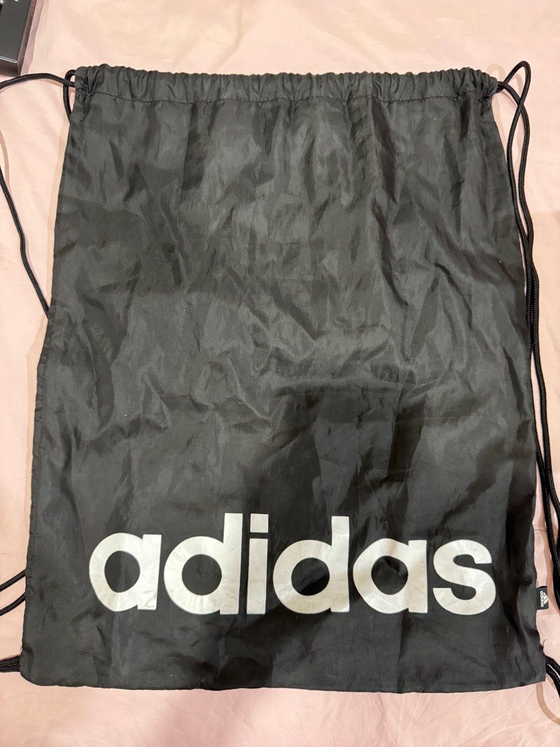Authentic Adidas Drawstring Bag (Category: Backpacks) located in Villasis. Submitted by thriftbyashi (Listing ID 1351216031, Image 1). Description: AUTHENTIC! Rfs: Tambak lang .