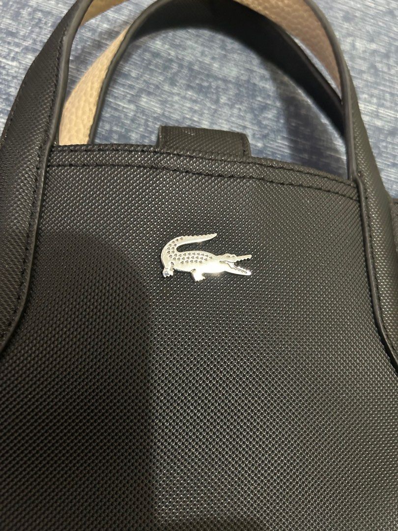 Authentic Lacoste (Category: Shoulder Bags) located in Rizal. Submitted by declutter101s (Listing ID 1351114283, Image 1). Description: Guaranteed authentic money back guaranteed if proven fake. Reversible .