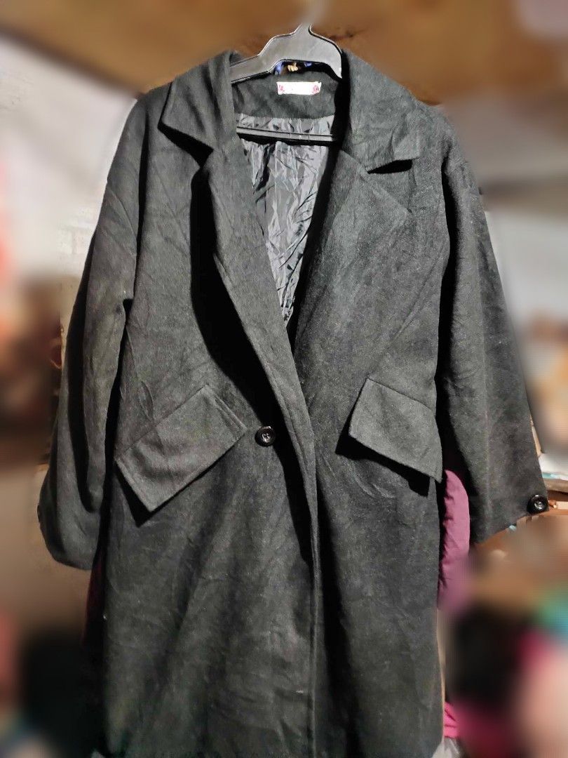 Black Trench Coat for winter (Category: Coats, Jackets and Outerwear) located in Manila. Submitted by rewearit_ (Listing ID 1351218541, Image 1). Description: Color: Black Size: Medium to Large RFS: decluttering MOP: Gcash/Maya/Bdo Transfer SF: Shouldered by Buyer via lalamove or grab.