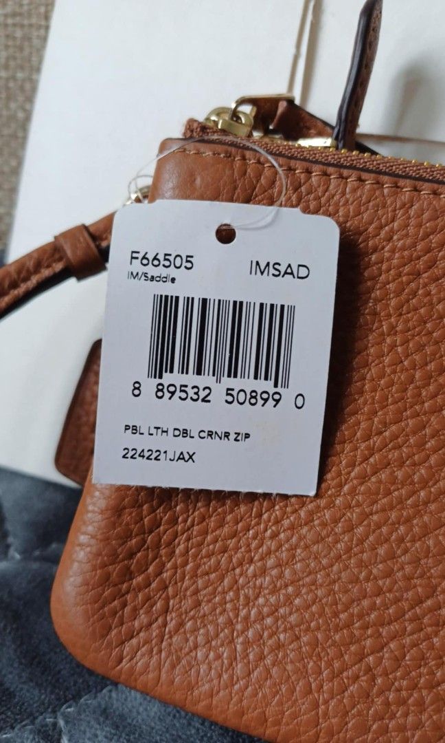 Coach - Double zip Wristlet (Category: Luxury Bags & Wallets) located in Las Pinas. Submitted by ajbash (Listing ID 1351087946, Image 2). Description: color: brown.
