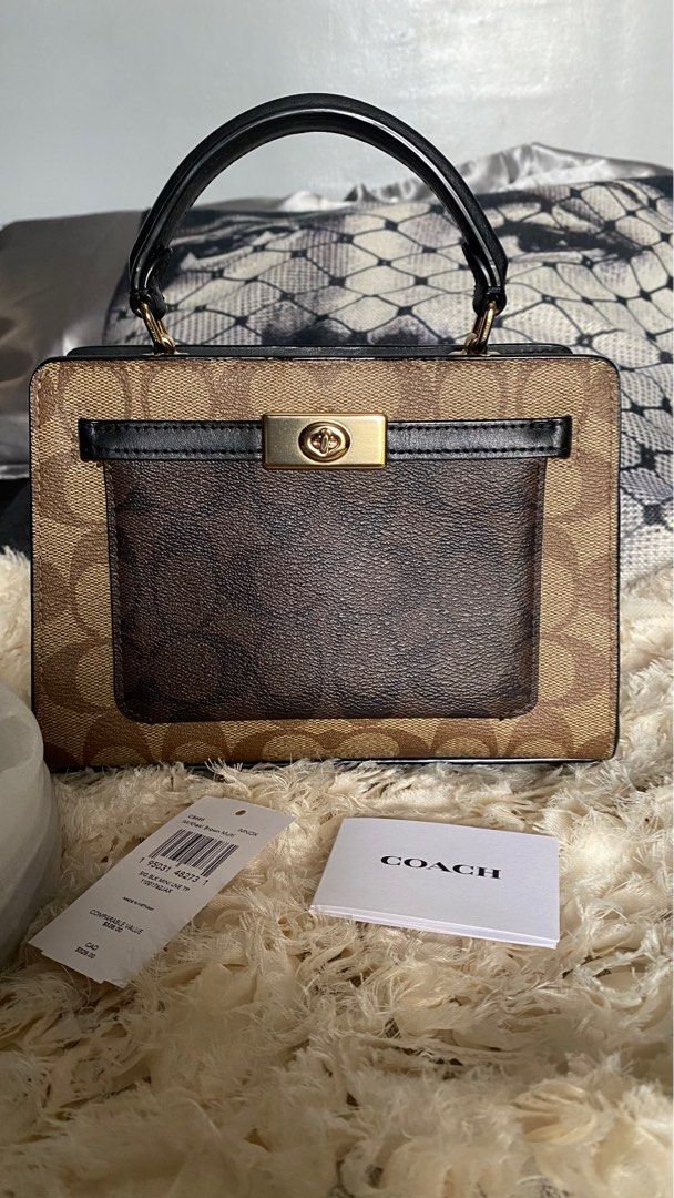 Coach Mini lane (Category: Luxury Bags & Wallets) located in Manila. Submitted by yonasaints46584 (Listing ID 1351132474, Image 2). Description: Barely used Original from canada outlet De clutter With paper bag Rush need funds ‼️.