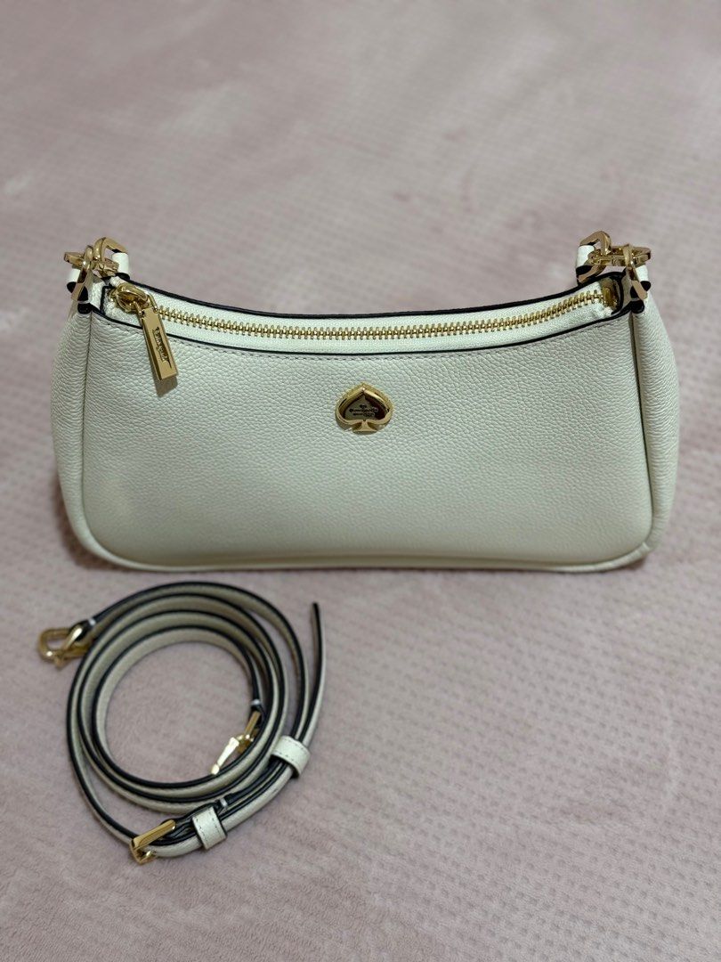 Kate Spade Kayla Shoulder Bag, Meringue (Category: Luxury Bags & Wallets) located in Muntinlupa City. Submitted by preloved_bymissm (Listing ID 1351192021, Image 2). Description: - Comes with 2 straps (short and long adjustable) - Can be used as shoulder bag and crossbody bag.