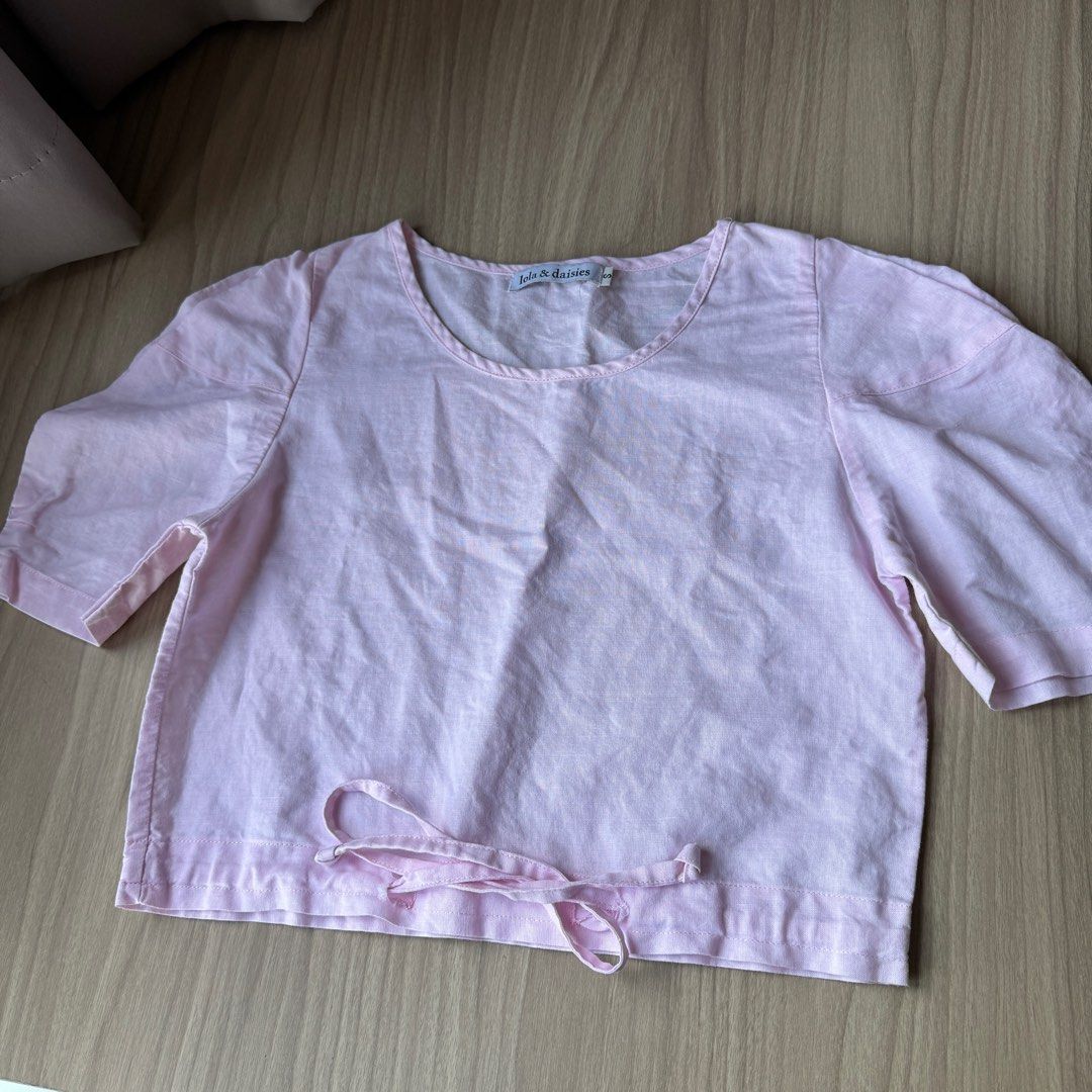 Lola & Daisies puff sleeve top (Category: Blouses) located in Mandaluyong City. Submitted by helloo.marii (Listing ID 1351194089, Image 1). Description: LOLA & DAISIES pink puff sleeved top - s on tag, fits xs-s - used twice only - modern filipiniana vibes! Same day deliv / Gogo Xpress.