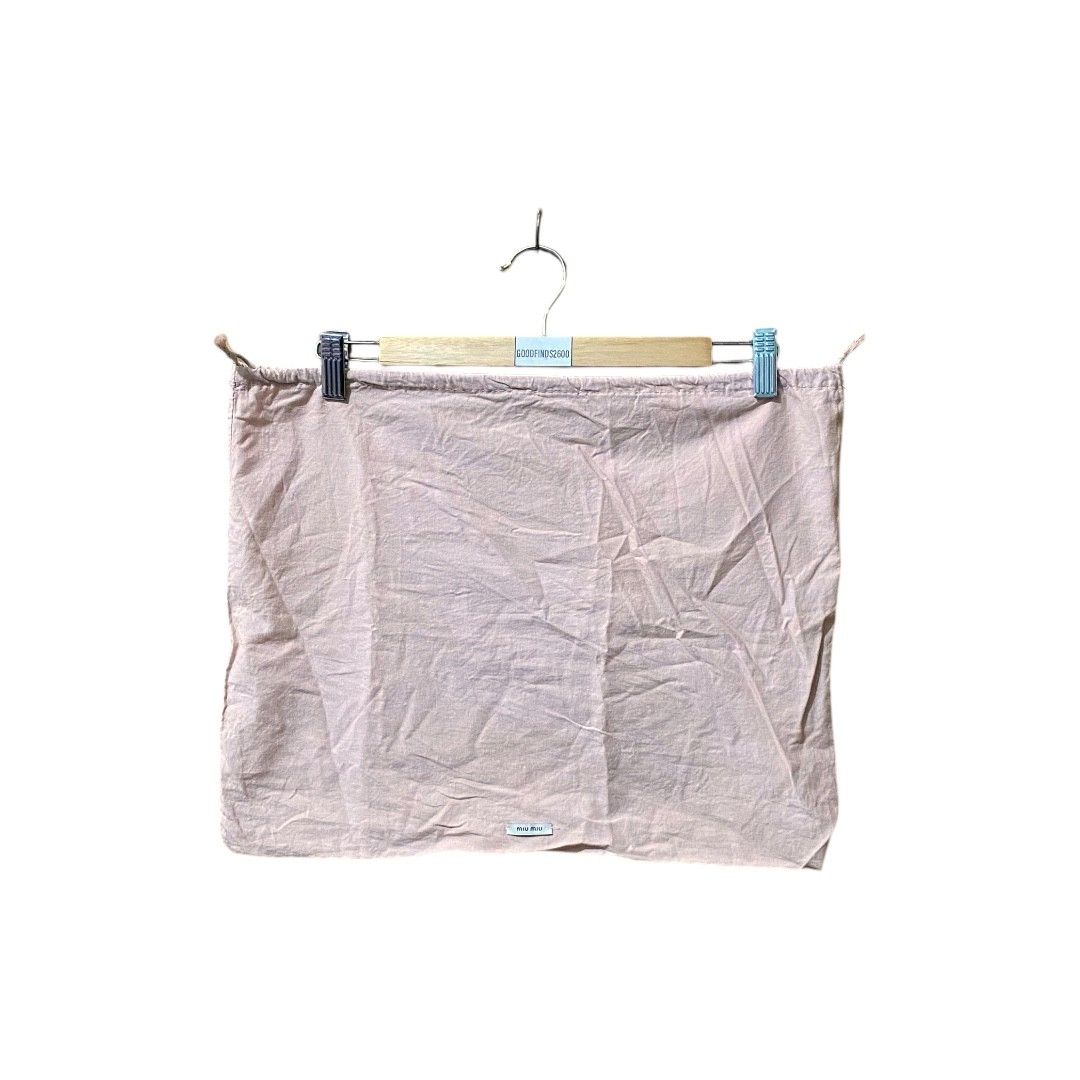 Miu Miu Dust Bag (Category: Luxury Bags & Wallets) located in Baguio. Submitted by goodfinds2600v2 (Listing ID 1351107376, Image 1). Description: Size: L Dimensions: L-14 W-17.5 Description: Dust Bag Condition: Excellent Issue: —.