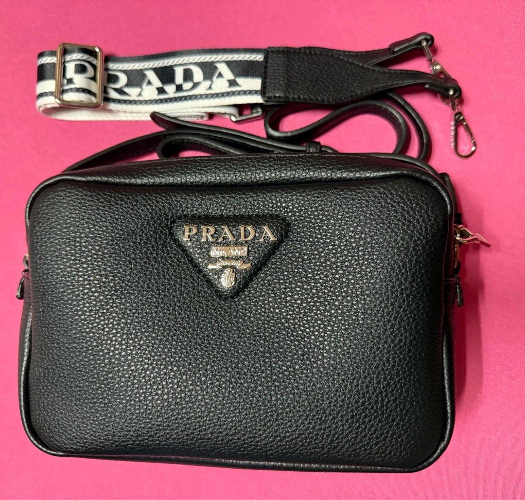 REPRICED! New/Unused Prada Double Zip Camera bag (Category: Cross-body Bags) located in Manila. Submitted by chamomillie (Listing ID 1351128699, Image 1). Description: !! Selling for a friend !! 📌 Lampo zipper 📌 Unused 📌 Complete Inclusions (Dust bag, 2 straps) Message for further inquiries. .