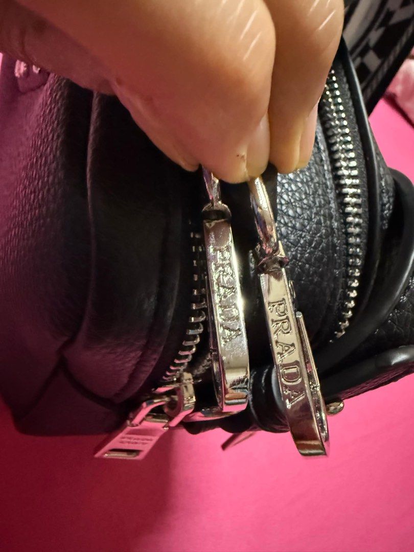 REPRICED! New/Unused Prada Double Zip Camera bag (Category: Cross-body Bags) located in Manila. Submitted by chamomillie (Listing ID 1351128699, Image 2). Description: !! Selling for a friend !! 📌 Lampo zipper 📌 Unused 📌 Complete Inclusions (Dust bag, 2 straps) Message for further inquiries. .