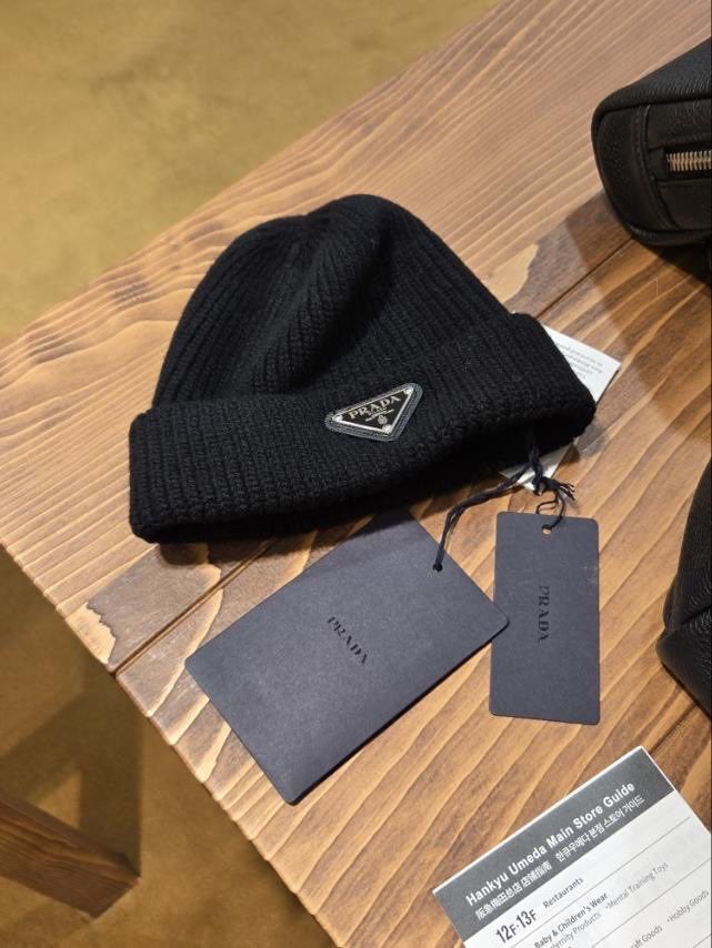 Prada beanie (Category: Caps & Hats) located in Mandaue City. Submitted by lux_declutter (Listing ID 1351203178, Image 1). Description: 100% authentic. Used 3x on a trip. Bought for 37,500. Slightly negotiable. .