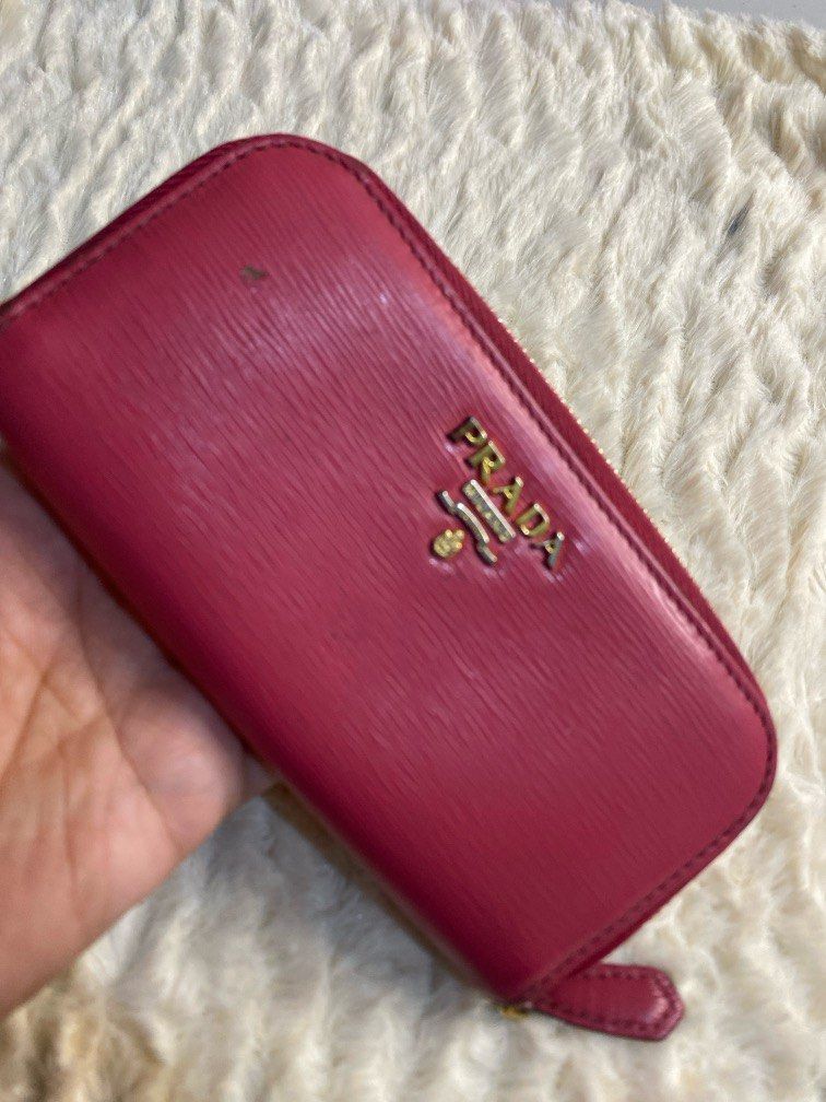 prada keycase card (Category: Luxury Bags & Wallets) located in Antipolo. Submitted by prelovedcloseta (Listing ID 1351087470, Image 1). Description: auth prada key holder can be use as caes holder and coinpurse preloved signs of usage pla check pics .