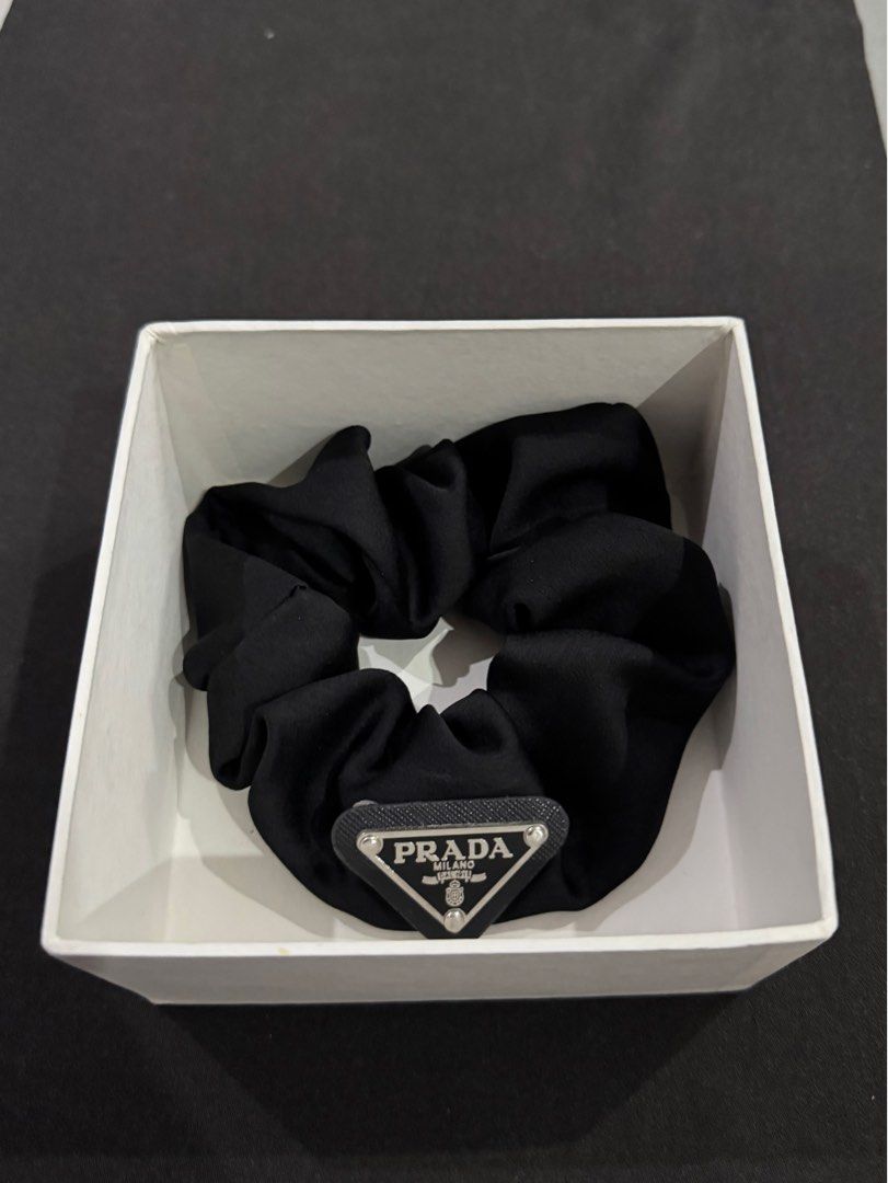 Prada Scrunchie (Category: Hair Accessories) located in Manila. Submitted by declutterwmeh (Listing ID 1351094279, Image 1). Description: Prada Scrunchie RFS: Got it as a gift. di nagamit at all, 950 + S.F Please do not lowball. Thank you! .