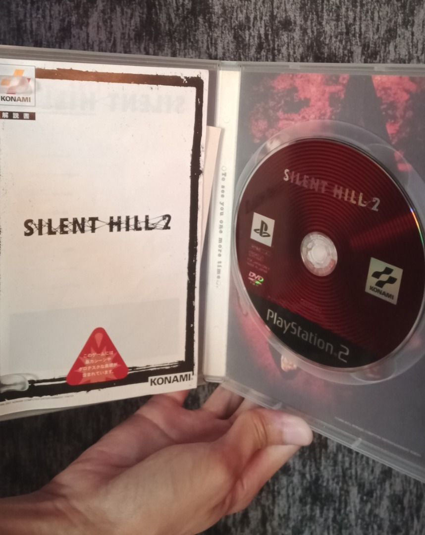 Silent Hill 2 (PS2) Japanese Version, Complete with Insert, Game Manual (Category: PlayStation) located in Marikina City. Submitted by vito_the_godfather (Listing ID 1351098313, Image 3). Description: Rare/Hard to Find Silent Hill 2 (PS2) Japanese Version Complete with Insert and Game Manual Tested and Working on Unmodified PS2 Phat Disc Condition: 8.5/10 (with minor common scratches) Art Case Condition: 9.5/10 Game Manual Condition: 9.5/10 Trade