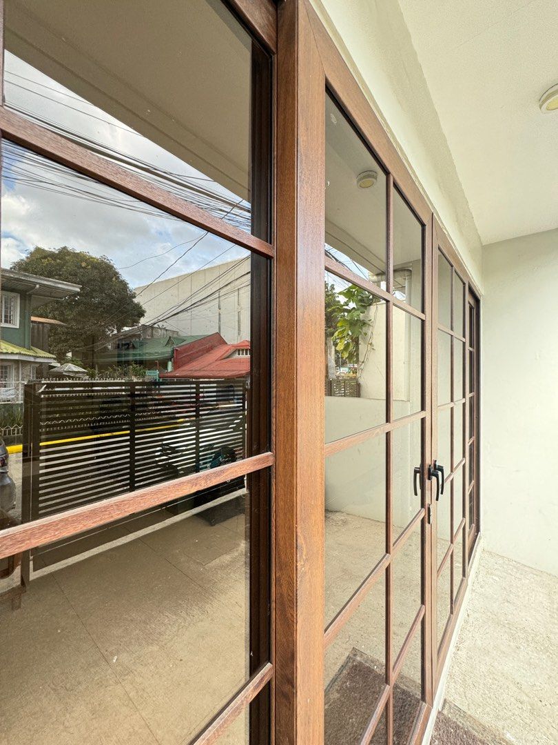Sliding door (Category: Office Furniture & Fixtures) located in Antipolo. Submitted by rianikasuason (Listing ID 1351112024, Image 3). Description: 7' H x 12'3.5" 4 panel (Fixed-Slide-Slide-Fixed) Door French style Brown uPVc frame 6mm Tempered glass With fibermesh insect screen.