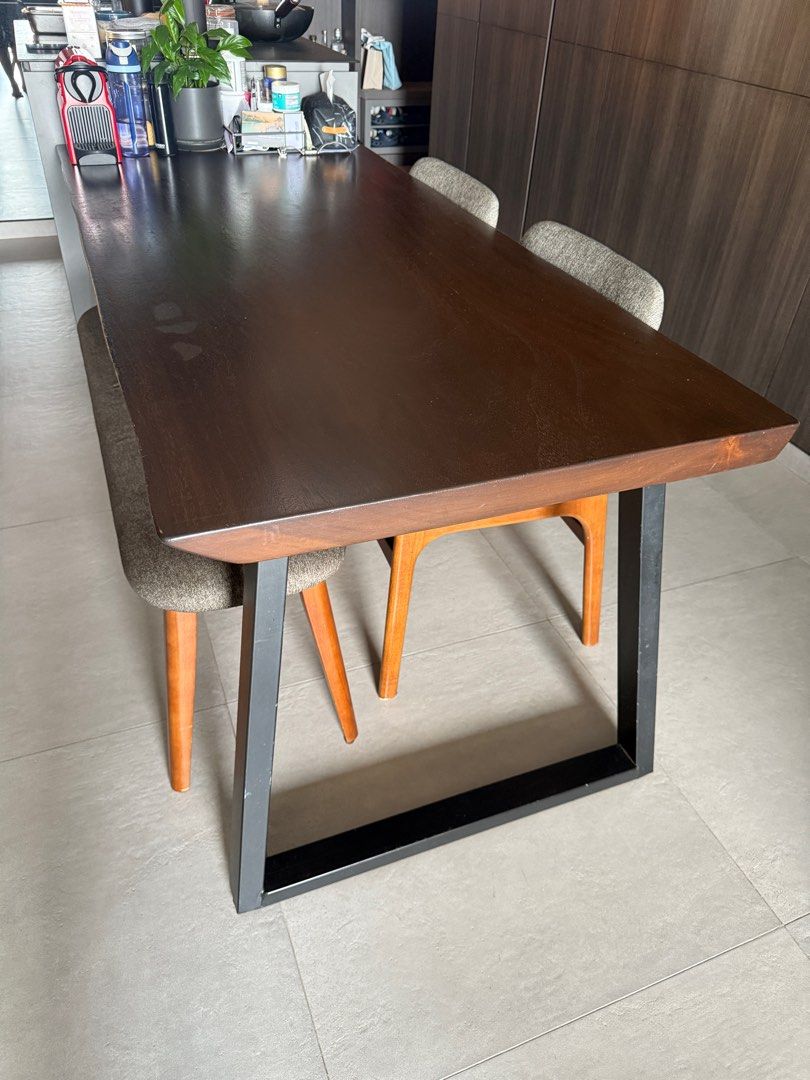 Solid Wood Dining Table (Category: Tables & Sets) located in Singapore. Submitted by skippy (Listing ID 1351104650, Image 2). Description: Solid wood dining table South America suar wood www.woodcapitol.com/suar-wood 1.8m L x 0.8m W Some flaws and scratches but overall good condition. Viewing is possible .