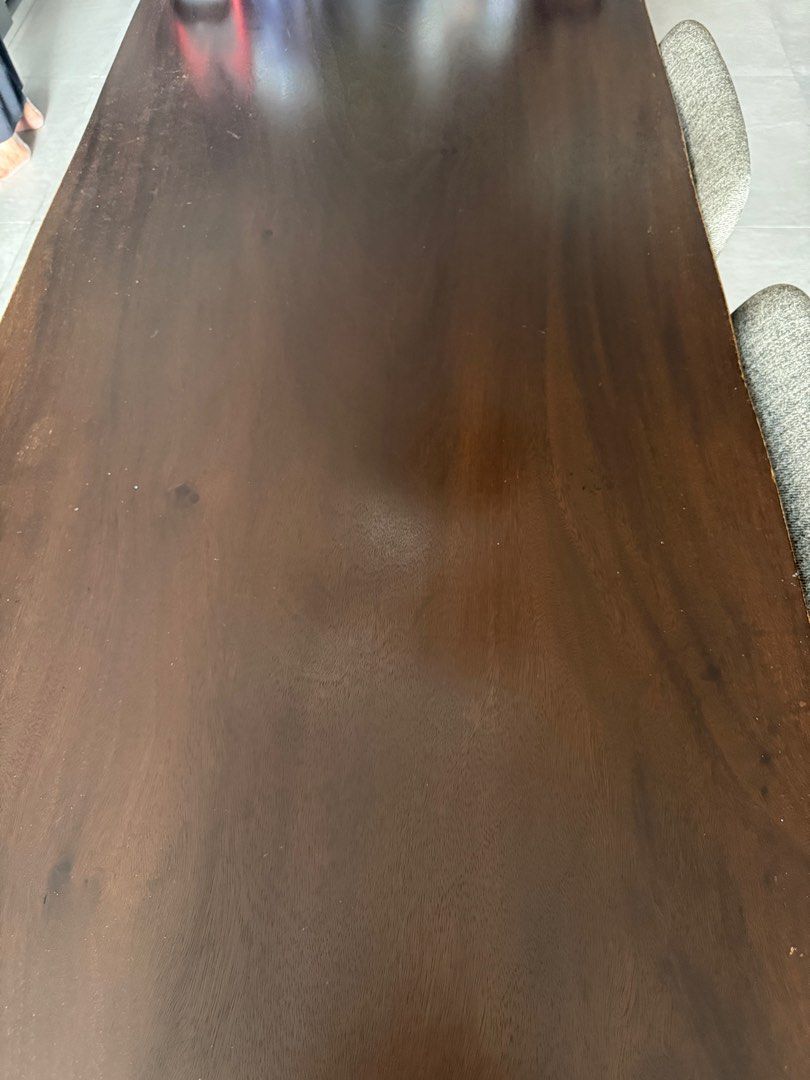 Solid Wood Dining Table (Category: Tables & Sets) located in Singapore. Submitted by skippy (Listing ID 1351104650, Image 3). Description: Solid wood dining table South America suar wood www.woodcapitol.com/suar-wood 1.8m L x 0.8m W Some flaws and scratches but overall good condition. Viewing is possible .