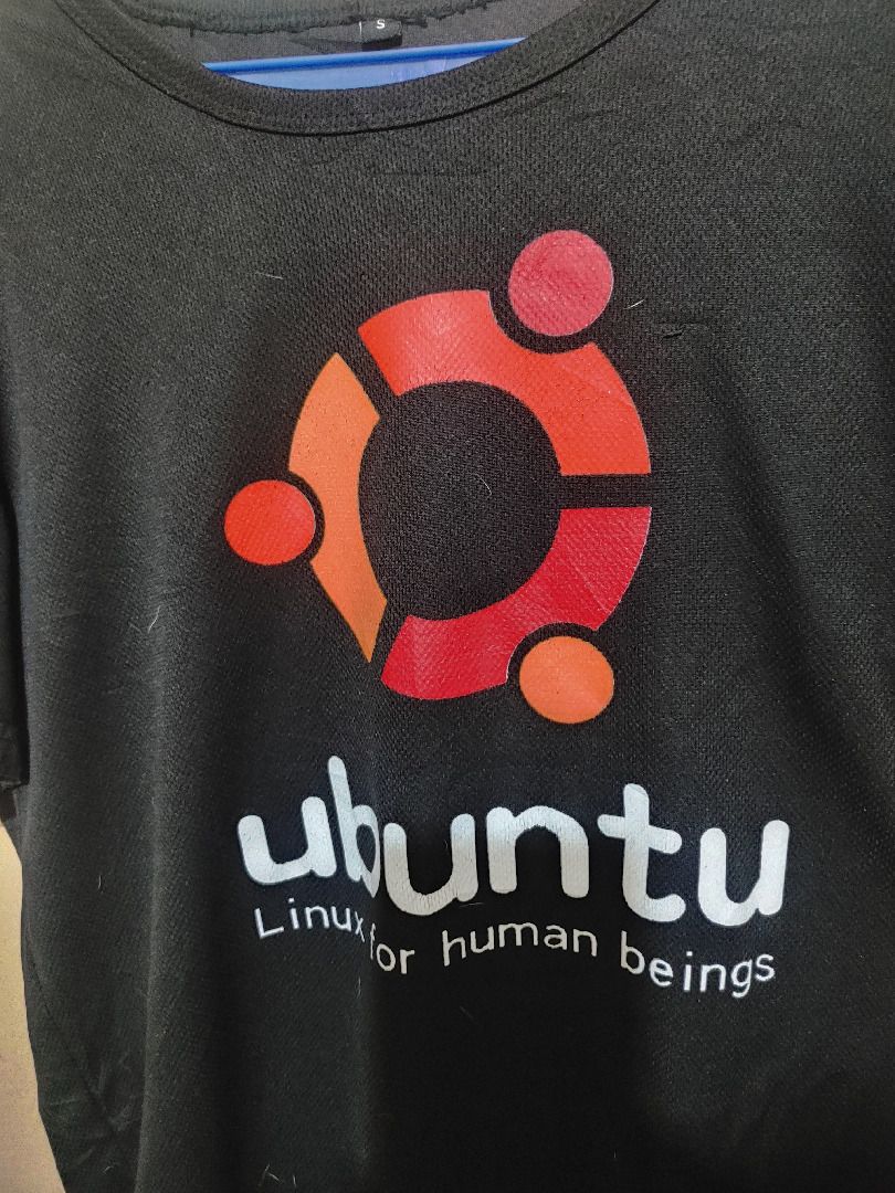 Ubuntu Tshirt (for geeks only) (Category: Tshirts & Polo Shirts ) located in Quezon City. Submitted by ppaya (Listing ID 1351095802, Image 2). Description: Ubuntu Logo. Linux for Human Beings. Small. 18inches chest Gcash Only 0935 8202060. Pick-up Only. Rider fees for buyer's account. Item is in Batasan Hills QC..