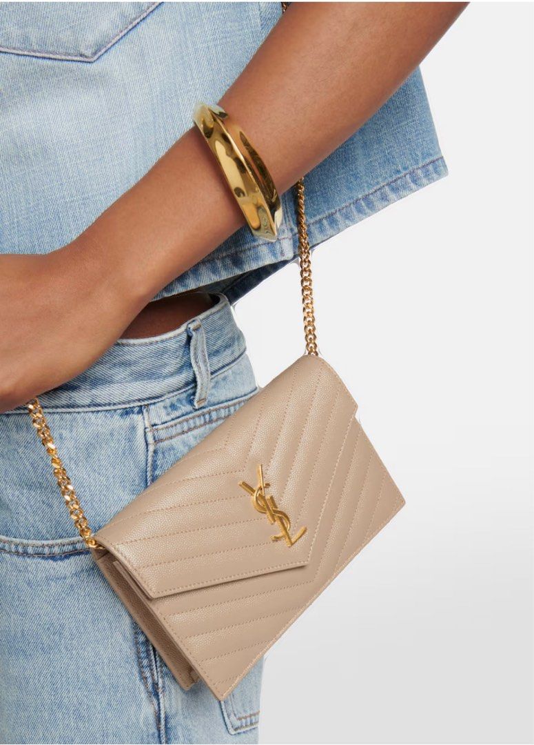 YSL Beige Sling Bag (Category: Luxury Bags & Wallets) located in Cavite. Submitted by ymer09 (Listing ID 1351085616, Image 3). Description: like new, Japan Source Payment First meet up around Tanza Cavite J&T lalamove + sf MOP- BDO and palawan .