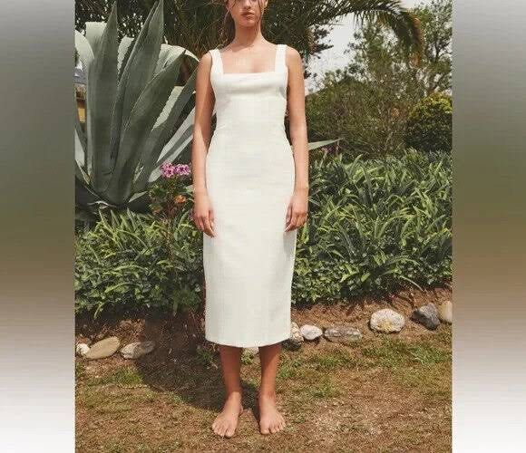 Zara White Midi Dress (Category: Dresses) located in Caloocan City. Submitted by sbpklover (Listing ID 1351198298, Image 3). Description: • Authentic • ONLY USED TWICE • Linen, not see through • Adjustable straps at the back • Message for more photos Helping tags mango bershka stradivarius h&m love bonito.