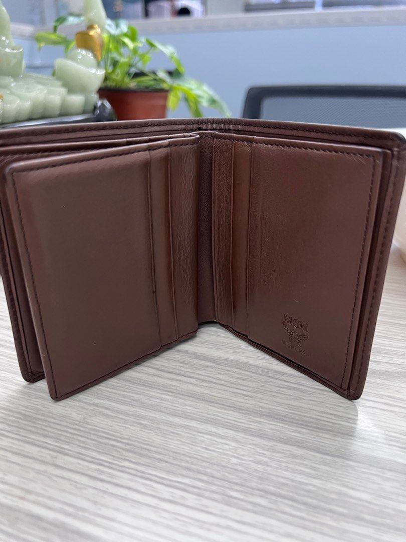 Authentic MCM bi fold wallet (Category: Luxury Bags & Wallets) located in Cagayan de Oro. Submitted by riggstuffs (Listing ID 1351370325, Image 3). Description: ➡️ Guaranteed Authentic MCM bifold wallet ➡️ Made in Korea ➡️ exterior has some signs of use but not flaws ➡️ interior is functional ➡️ Rank B in condition Disclaimer: Riggstuffs is not associated or affiliated with the brand posted. All copyrights and trades belong solely to the original