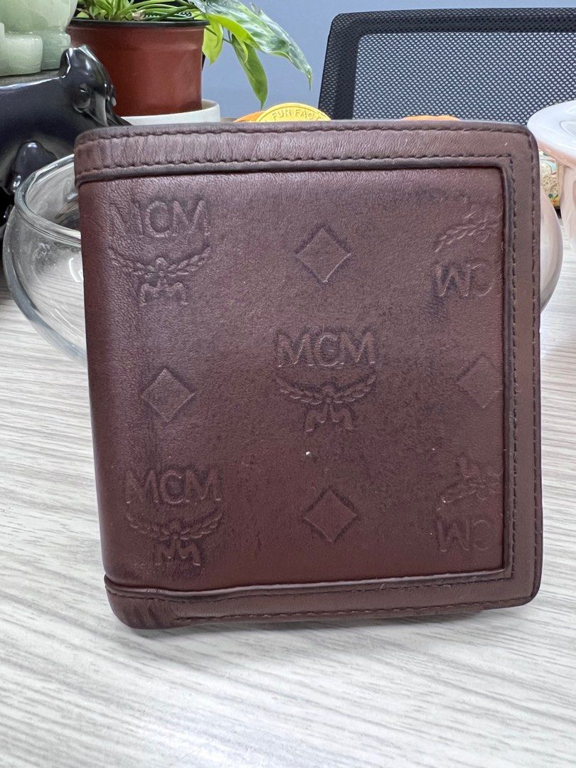 Authentic MCM bi fold wallet (Category: Luxury Bags & Wallets) located in Cagayan de Oro. Submitted by riggstuffs (Listing ID 1351370325, Image 2). Description: ➡️ Guaranteed Authentic MCM bifold wallet ➡️ Made in Korea ➡️ exterior has some signs of use but not flaws ➡️ interior is functional ➡️ Rank B in condition Disclaimer: Riggstuffs is not associated or affiliated with the brand posted. All copyrights and trades belong solely to the original