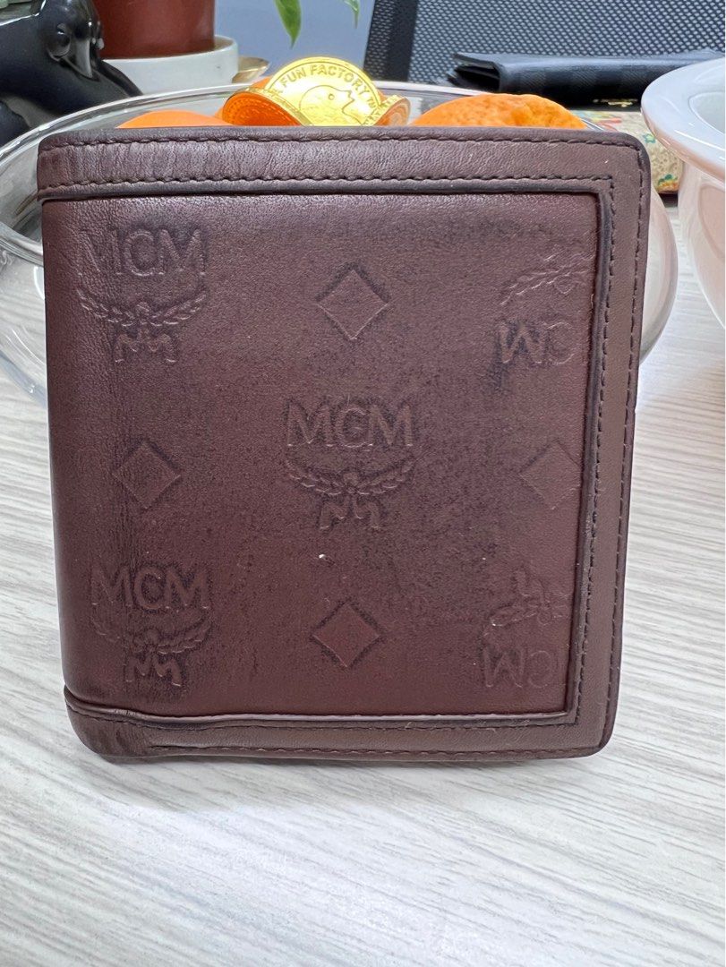 Authentic MCM bi fold wallet (Category: Luxury Bags & Wallets) located in Cagayan de Oro. Submitted by riggstuffs (Listing ID 1351370325, Image 1). Description: ➡️ Guaranteed Authentic MCM bifold wallet ➡️ Made in Korea ➡️ exterior has some signs of use but not flaws ➡️ interior is functional ➡️ Rank B in condition Disclaimer: Riggstuffs is not associated or affiliated with the brand posted. All copyrights and trades belong solely to the original