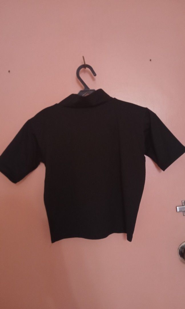 Black turtle neck crop top (Category: Others Tops) located in Makati City. Submitted by rbbql (Listing ID 1351330720, Image 2). Description: can fit to small to medium size free if you buy worth more than 300php.