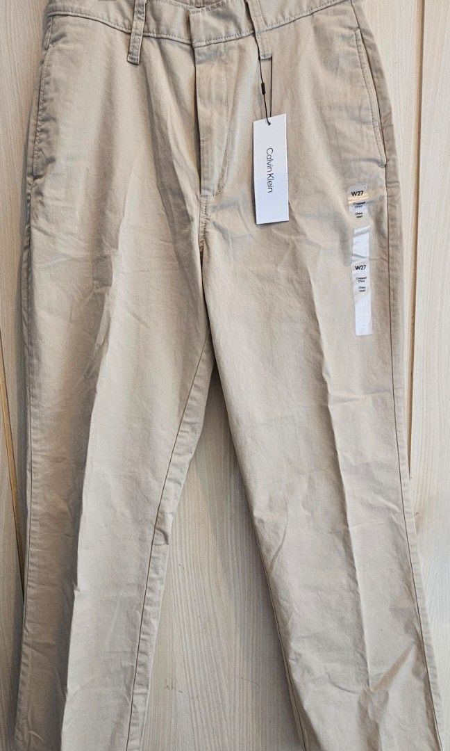 Calvin Klein Chinos Trousers (Category: Other Bottoms) located in Makati City. Submitted by styledge.ph (Listing ID 1351299909, Image 1). Description: Brand: Calvin Klein Description: Straight-cut,high-waisted Chino Stretch trousers. Bought from Calvin Klein Outlet in Toronto (Not an Overrun/Surplus). Size: W 27 (but will fit up to 29") RFS: I gained weight, could no longer fit me. Price slightly negotiable..