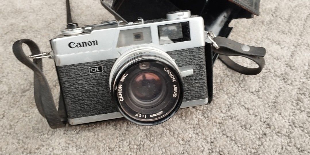 Canon canonet QL17 camera collection Display (Category: Cameras) located in Malabon City. Submitted by immortalpicker (Listing ID 1351371624, Image 1). Description: Canon canonet QL17 camera collection, display Brand- canon Model canonet QL17 Color = silver Material = aluminum With leather case and damage case Made in Japan 2nd hand with scratch No warranty If there's Damage or Issues they can be seen in the last picture Price = 4,000 My location