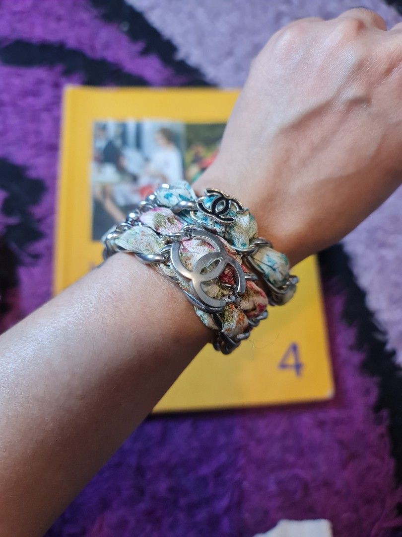 Chanel Multicolor Charm Fabric (Category: Luxury Accessories) located in Angeles City. Submitted by reallygraceful (Listing ID 1351274255, Image 3). Description: Chanel Multicolor Charm Fabric 🩷Good Condition 🩷10 yo Chanel bracelet bought in Hk 🩷walang lock di pasok lang sa hands 🩷naka stock lang di ko na nagamit 🩷walang kalawang 🩷2 pcs na free na yung Isa 🩷minor flaws may excess fabric NO LOW-BALLING ❌️.