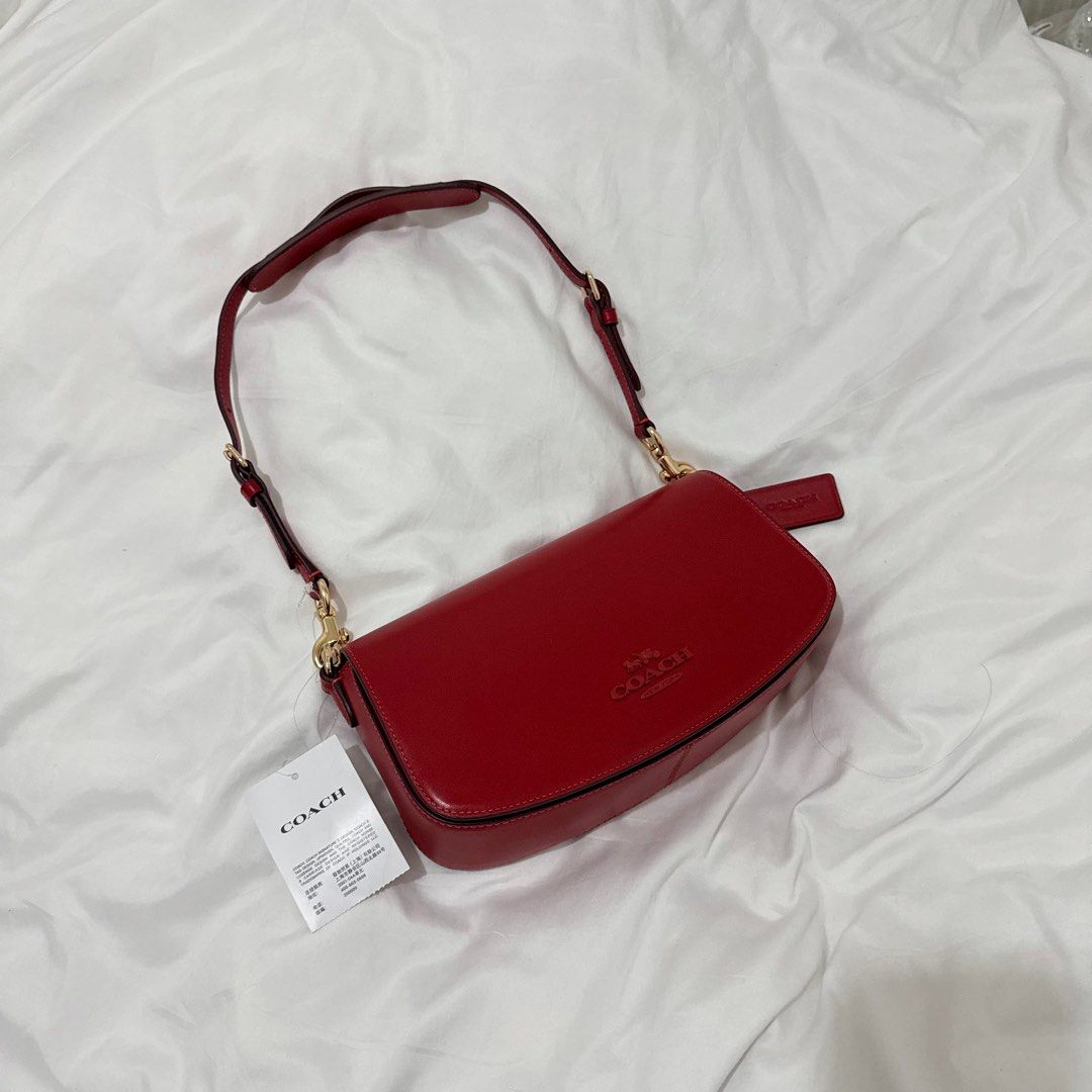 Coach andrea shoulder bag in bold red (Category: Luxury Bags & Wallets) located in Mandaluyong City. Submitted by ldr.aa (Listing ID 1351411237, Image 2). Description: Item code: CT768-IMUP7 Guaranteed brand new and original from coach outlet. Rfs: This is a pasalubong from my in-laws. I have too many coach bags na, nagsasawa na me.. if you can just see how many coach items i have from bags to shoes 😭 (my in-laws love coach THAT MUCHHH) BUTTT th