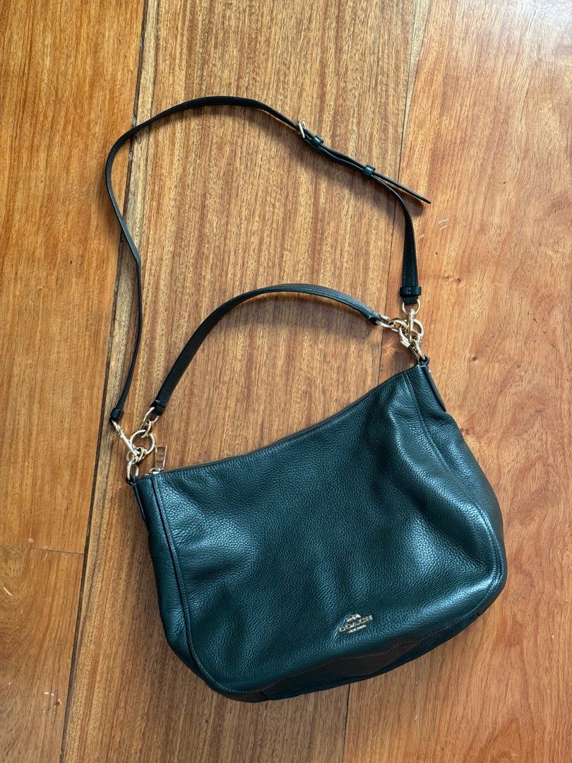 COACH Hobo Bag short and long strap (Category: Shoulder Bags) located in Marikina City. Submitted by closetsale_mar (Listing ID 1351324267, Image 2). Description: -Hunter Green color -Polished pebble leather - removable long strap - can be used as shoulder bag or cross body bag -minor peeling on the leather logo inside -exterior of the bag and everything else is great quality - bought in the USA.