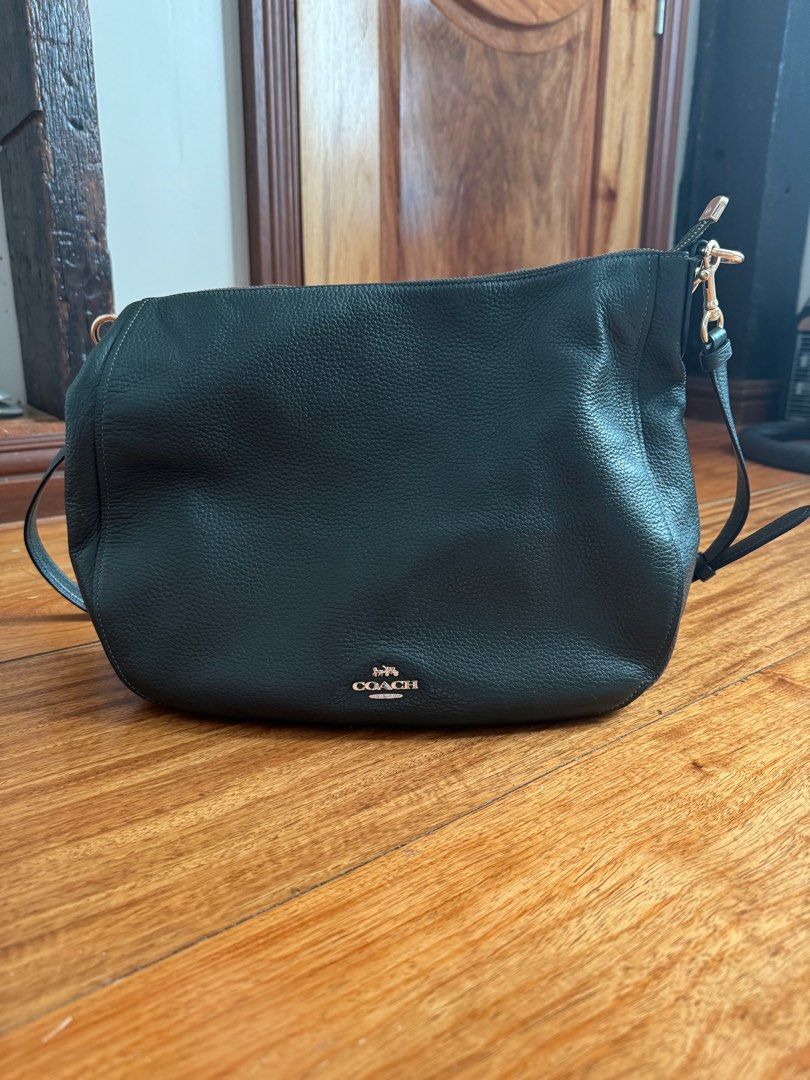COACH Hobo Bag short and long strap (Category: Shoulder Bags) located in Marikina City. Submitted by closetsale_mar (Listing ID 1351324267, Image 3). Description: -Hunter Green color -Polished pebble leather - removable long strap - can be used as shoulder bag or cross body bag -minor peeling on the leather logo inside -exterior of the bag and everything else is great quality - bought in the USA.
