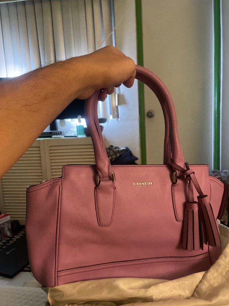 Coach Legacy bag (Category: Purses & Pouches) located in Manila. Submitted by max0693 (Listing ID 1351421801, Image 2). Description: rare color of Light purple coach bag. unused, with dustbag. Guaranteed original. Still negotiable. rfs: decluttering of sister's bag collection. this was unused and kept inside the closet for quite sometime. Signs of ageing... .