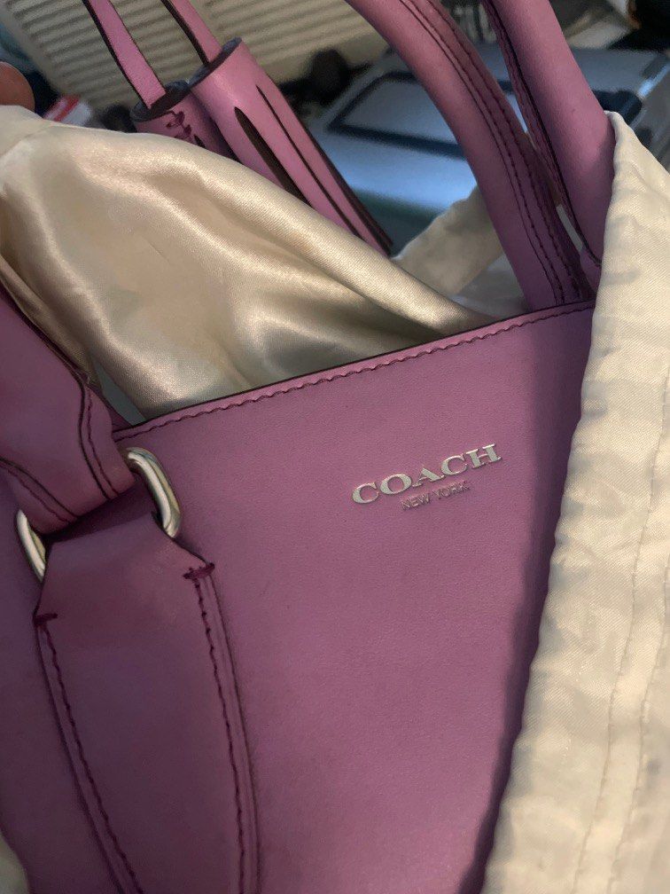 Coach Legacy bag (Category: Purses & Pouches) located in Manila. Submitted by max0693 (Listing ID 1351421801, Image 1). Description: rare color of Light purple coach bag. unused, with dustbag. Guaranteed original. Still negotiable. rfs: decluttering of sister's bag collection. this was unused and kept inside the closet for quite sometime. Signs of ageing... .
