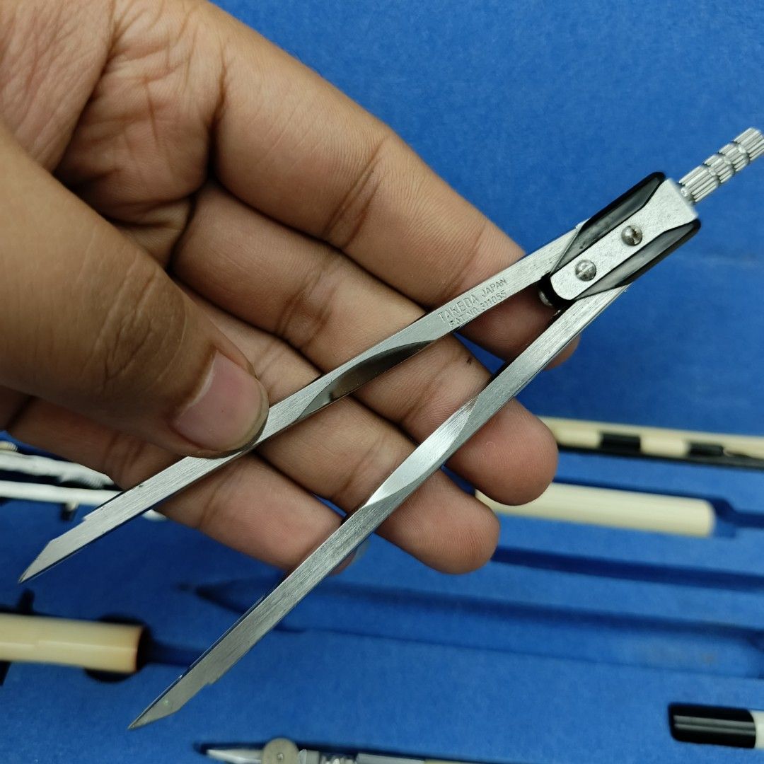 Drafting Tool Compass with Box And Markings (Category: Stationery & School Supplies) located in Pasig City. Submitted by jeffzyyyyy (Listing ID 1351284691, Image 3). Description: Drafting tool with box Super Takeda No flaws as is.