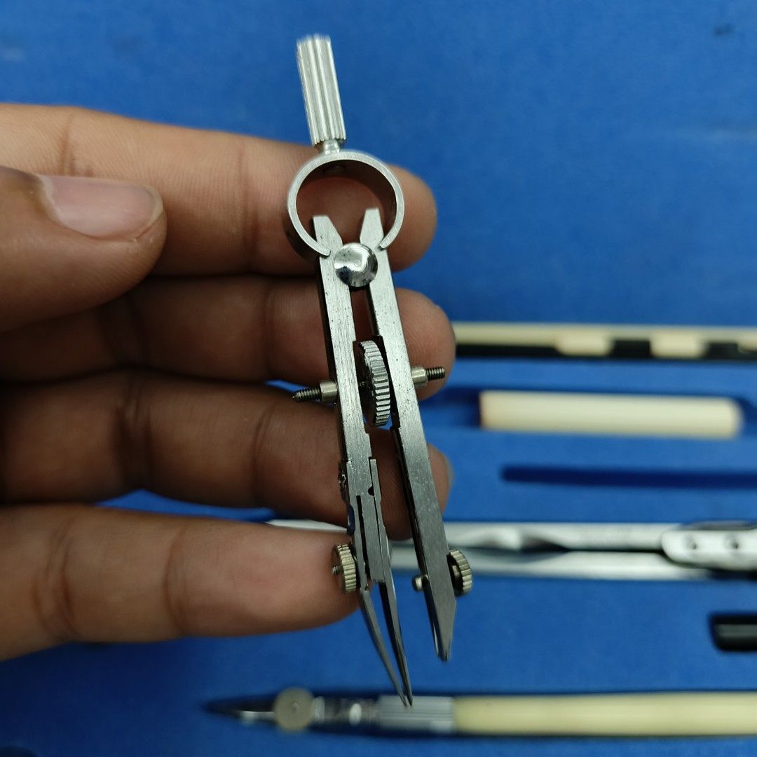 Drafting Tool Compass with Box And Markings (Category: Stationery & School Supplies) located in Pasig City. Submitted by jeffzyyyyy (Listing ID 1351284691, Image 2). Description: Drafting tool with box Super Takeda No flaws as is.