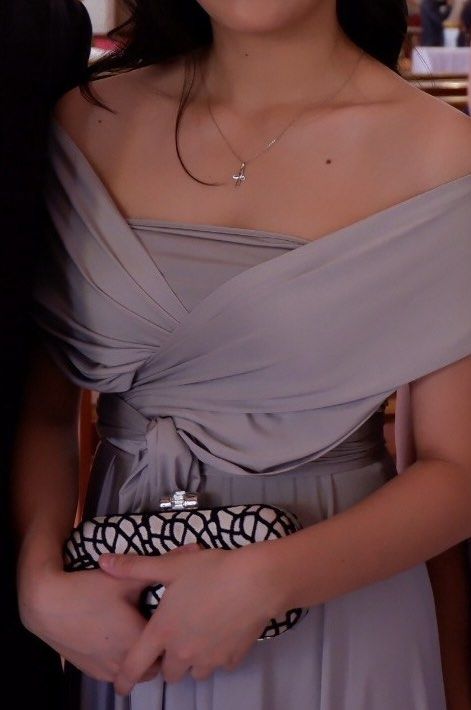 Formal Dress / Infinity Dress (Category: Evening dresses & gowns) located in Lucena. Submitted by ajmm_29 (Listing ID 1351397360, Image 2). Description: Condition: Lightly used Floor length with tube 38 inches Can fit S to L Can be worn in 27 ways Material: Spandex Color: Ash Grey / Light Grey.