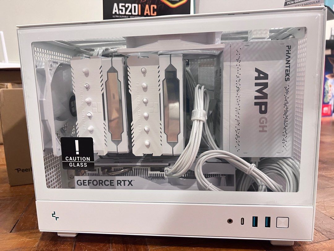 Gaming PC ITX build- CH160 , RTX4060 (Category: Desktops) located in Manila. Submitted by eleven11ym (Listing ID 1351397606, Image 1). Description: Full White MINI ITX build Super portable! Brand new with stickers Case: Deep cool CH160 White CPU: Ryzen 7 5700x GPU: NVIDIA GALAX RTX 4060 OC- White 8gb Mobo: GIGABYTE A520I AC wifi bluetooth Psu: Phanteks AMP GH 750W Gold plus white fully modular w braided cables CPU fan: Thermalright Peerless Assas