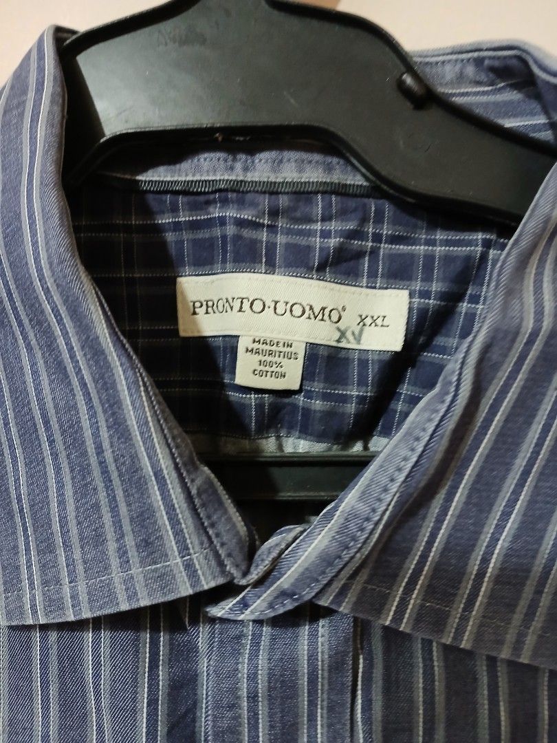Mens longsleeve button down stripe (Category: Formal Shirts) located in Caloocan City. Submitted by erickaban14 (Listing ID 1351385196, Image 2). Description: Excellent Condition and presentable Stripes with blue,gray,white. US size XXL. 26" W 30"L Can be shipped nationwide GCASH MOP.
